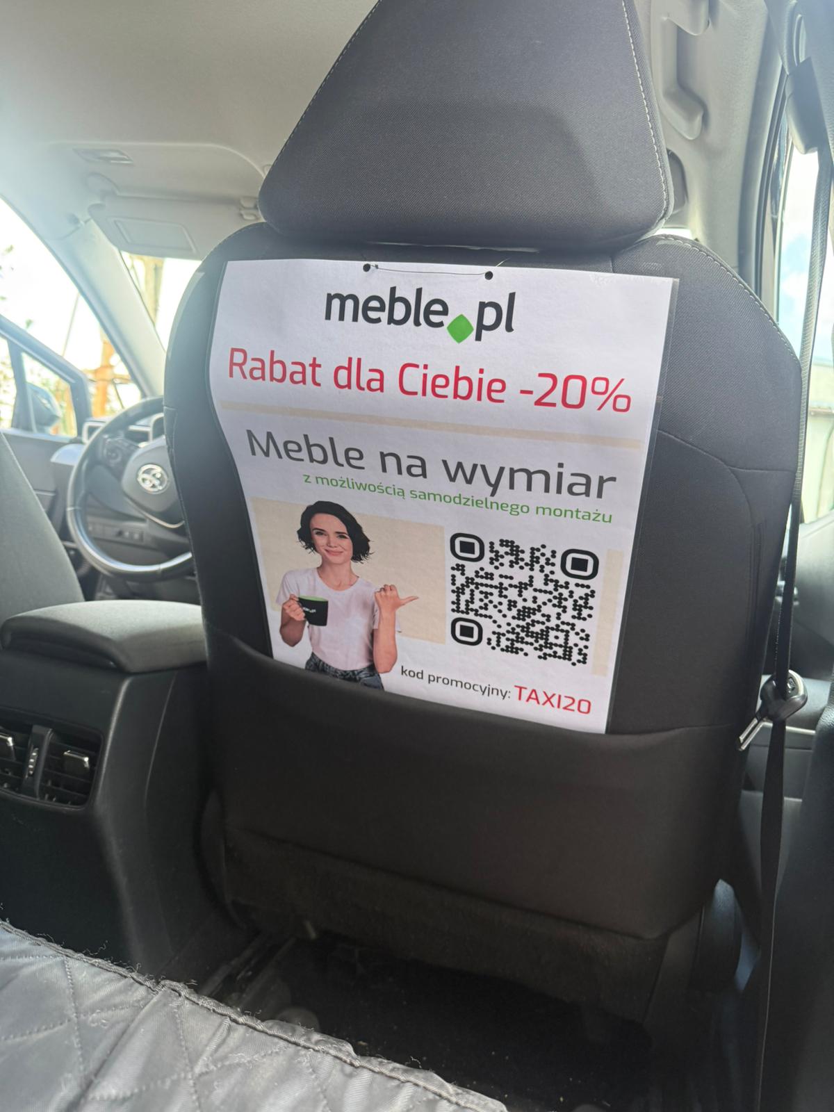 reklama z tyłu fotela pasażera format a3 meble.pl