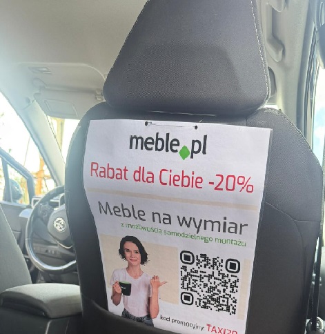 reklama z tyłu fotela pasażera format a3 meble.pl